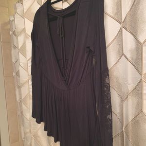 Black open-back bell bottom sleeve top